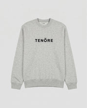 A light heather gray crewneck sweatshirt with the brand name 'TENORE' printed in black across the chest.